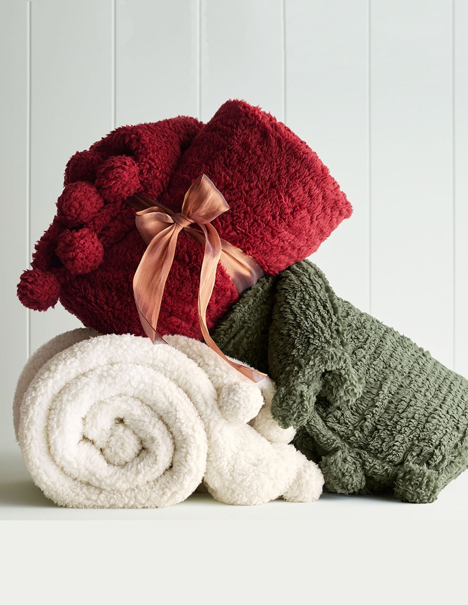 Frazada clásica de tejido plano cozy pom pom
